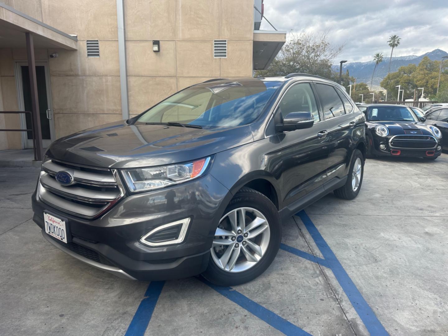 2016 Gray /Black Ford Edge SEL AWD (2FMPK4J93GB) with an 2.0L L4 DOHC 16V engine, 6A transmission, located at 30 S. Berkeley Avenue, Pasadena, CA, 91107, (626) 248-7567, 34.145447, -118.109398 - Low Miles! - Photo#0